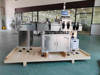 2025.6.27危地馬拉立式圓瓶不干膠貼標機帶轉盤